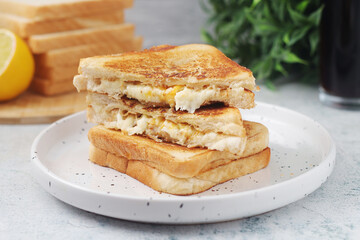 Grilled cheese sandwiches served for eating	