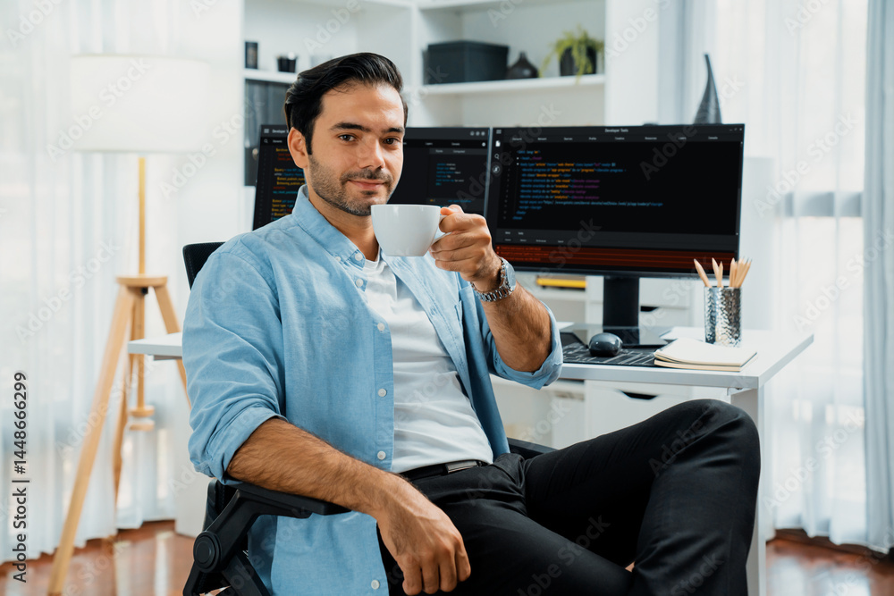 Poster profile's smart it developer looking camera to pose holding coffee cup against on software developme