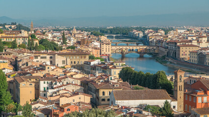 Top view of Florence city timelapse at sunrise with arno river bridges and historical buildings