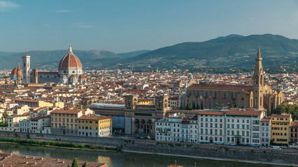 Fototapeta premium Florence aerial cityscape view timelapse from Michelangelo square on the old town with Santa Croce church in Italy