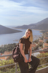 Remote work on vacation with laptop by sea. Digital nomad lifestyle, freelancer, female, freedom, beach, travel, online job, nature, mindfulness, solitude, millennial, connection, work