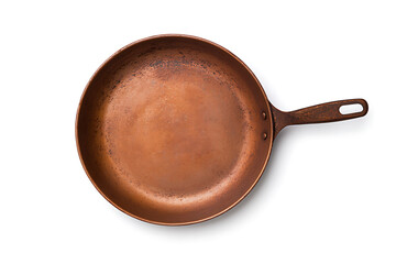 Top-down studio shot of a copper-colored frying pan with a long handle, centered on a white background, showcasing its aged appearance and simple design.