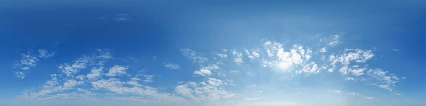 seamless cloudy blue evening sky hdri panorama 360 degrees angle view with zenith and beautiful clouds before sunset for use in 3d graphics or game development as sky dome or edit drone shot