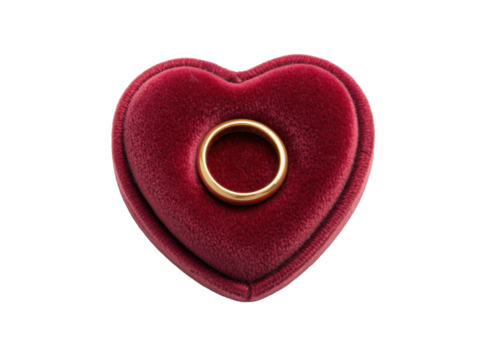 Elegant gold ring in a heart-shaped velvet box for romantic occasions, cut out