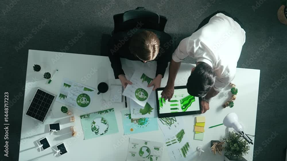 Poster top down view of business man presenting sustainable idea to manager by using tablet display esg env