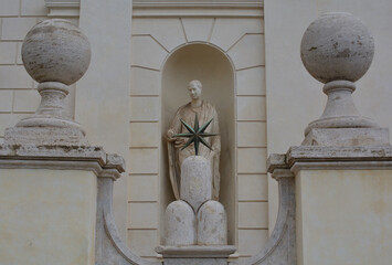 Three mountains topped by a star used as a decoration of buildings. Pope Sixtus V symbol.