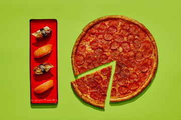 Pepperoni pizza and sushi creating a delightful culinary contrast on vibrant green background