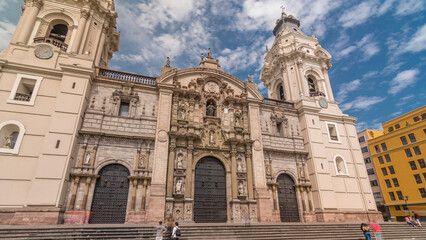 Fototapeta premium The Basilica Cathedral of Lima is a Roman Catholic cathedral located in the Plaza Mayor timelapse hyperlapse in Lima, Peru