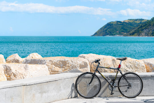 Rimini, Italy - September 1, 2022: Multi-speed bicycle with V-brakes. Sport and active life concept in the summer time