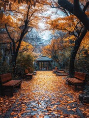 Obraz premium Enchanting autumn scene with path covered in golden leaves in the park