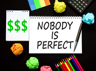 Nobody is perfect symbol. Concept words Nobody is perfect on beautiful white note. Calculator....