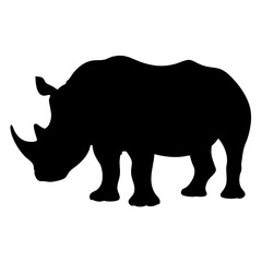 Silhouette of a rhino standing tall with prominent horns and thick skin