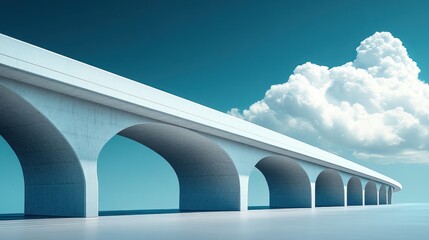 Modern concrete arch bridge against a clear sky
