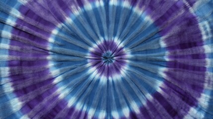 Abstract blue and purple tie-dye pattern with radiating circular design