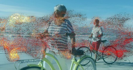 Couple walking bicycles along beach shoreline, showing health marketing chart and wave icons - Powered by Adobe