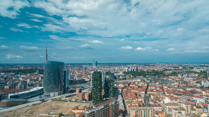 Obraz premium Milan aerial view of modern towers and skyscrapers and the Garibaldi railway station in the business district timelapse