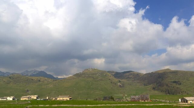 Timelapse of Fast Moving Cloud Formations Over Mountain Peaks