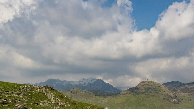 Timelapse of Fast Moving Cloud Formations Over Mountain Peaks