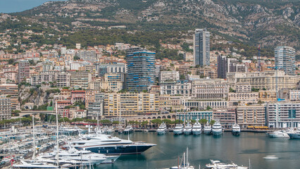 Obraz premium Monte Carlo city aerial panorama timelapse. View of luxury yachts and apartments in harbor of Monaco, Cote d'Azur.