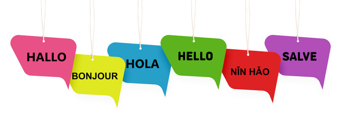 Paper speech bubbles with greetings in different languages hanging on white background. Banner design © New Africa