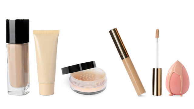 Liquid foundation, powder, sponge and concealer isolated on white, set