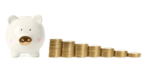 Piggy bank and stacks of coins from bigger to smaller on white background