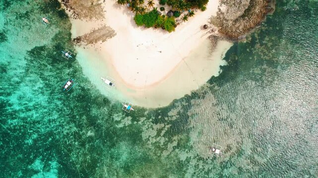 4K Aerial Drone Footage of Guyam Island in Siargao, Philippines &ndash; Tropical Sandbar, Clear Blue Water, and Palm Trees