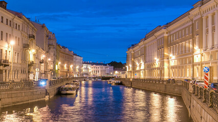 Obraz premium Night view of the Moyka River Quay with bridge timelapse. Saint Petersburg, Russia.