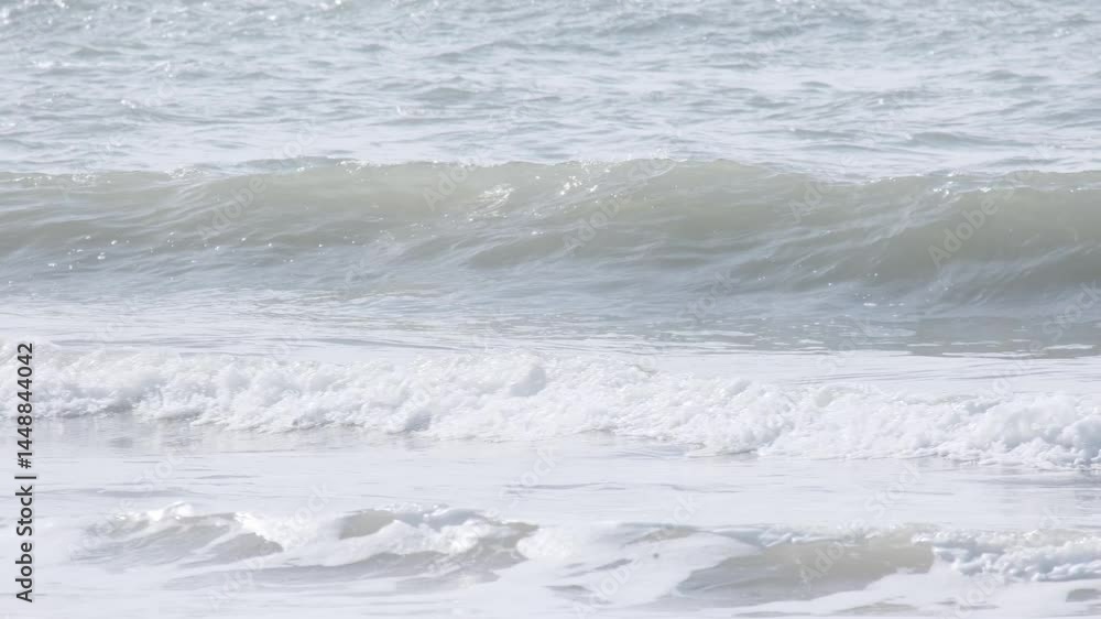 Aufkleber gentle waves gradually transform into powerful breakers, creating a captivating display of nature's 