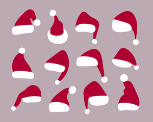 Collection of Santa Claus hats. Vector illustration. Original Christmas design. Set of Santa Claus hats. Red hats of Santa Claus on a light background