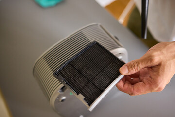 How To Effectively Clean a Portable Air Purifier Filter Utilizing a Vacuum Cleaning Tool