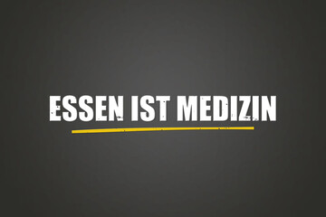 Essen ist Medizin (Food is medicine) - A blackboard with white text.