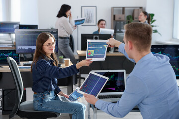 Stock exchange. Business team working together in office