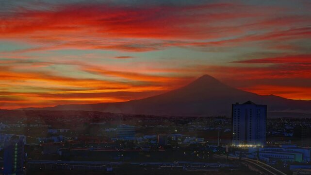 Popocat&eacute;petl volcano erupting video at the daytime with beautiful fluffy clouds
