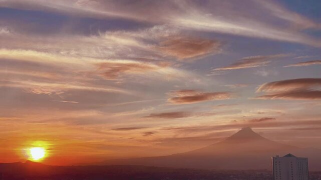 Puebla cityscape video with beautiful multi coloured clouds