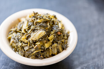 Close-up of bowl of fresh cooked collard greens