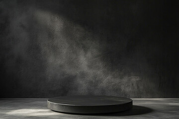 Dramatic spotlight illuminates a minimalist podium against a textured black backdrop