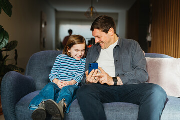 Dad learning daughter how to order things online