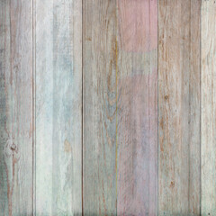 Pastel multicolor wooden plank texture with soft blue, pink, and beige tones, subtle grain, and lightly weathered paint. Elegant rustic background for branding, wallpapers, and modern designs.