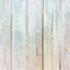 Obraz premium Light pastel weathered wooden plank texture with faded blue and beige tones, soft grain, and subtle distress. Elegant rustic background ideal for branding, wallpapers, and vintage designs.