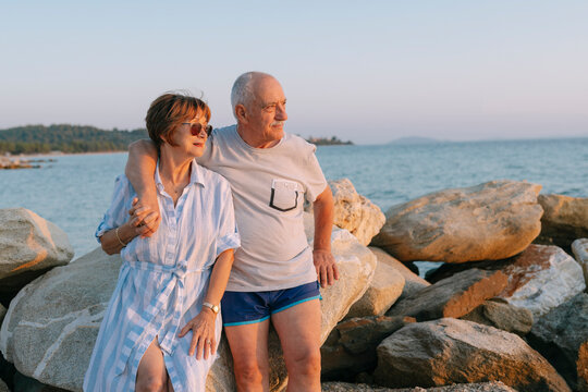 Senior Couple On A Beach - Powered by Adobe