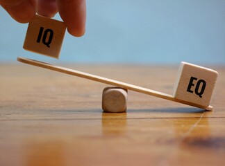 Balancing the Concept Between Intelligence and Emotional Intelligence Using Wooden Blocks. hands...