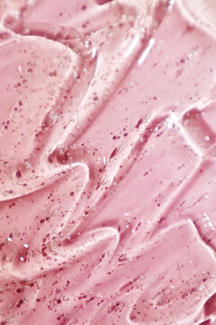 Transparent pink gel texture on pastel background

