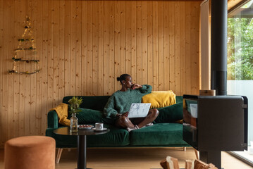 Thoughtful woman looking at window
