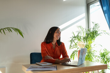 Happy woman working at office