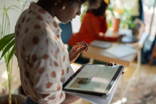 Woman using tablet computer