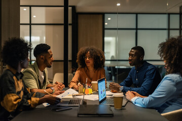 Businesspeople negotiating in meeting room