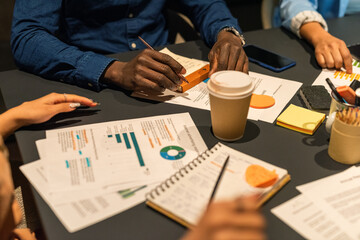 Colleagues discussing financial situation in company