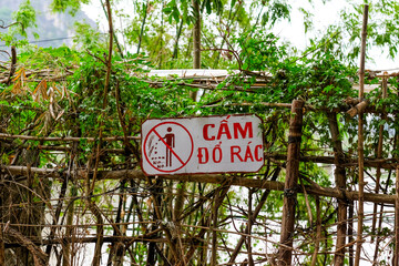  No Littering Sign in Greenery