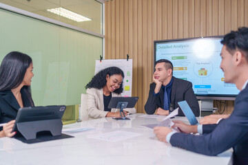 multiracial business team at work together,board meeting to analyze and discuss the situation on...
